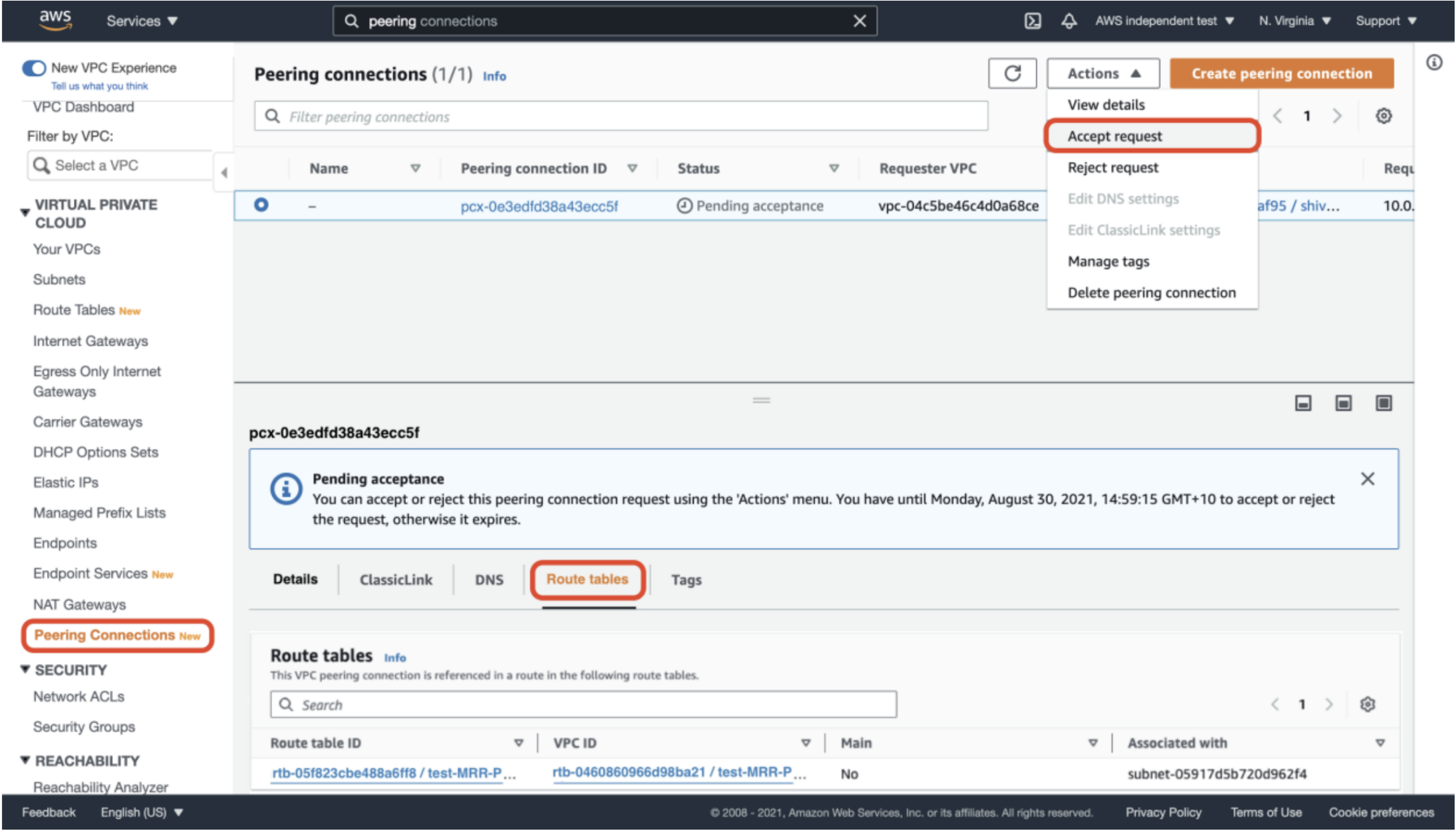 In the AWS VPC console, choose Peering Connections in the sidebar. Select the pending VPC connection and press Accept request in the Actions dropdown. Then choose the Route tables tab